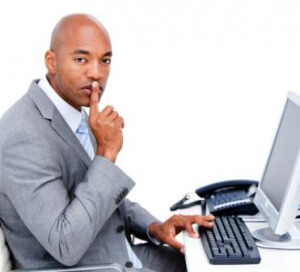 marin pocket listings image man wearing suit whispering at computer with phone