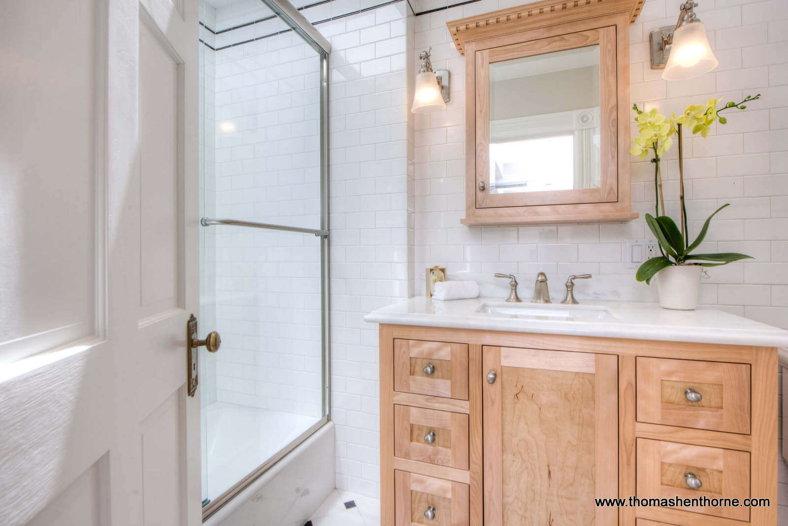 2 Foothill Road San Anselmo 29 photo of door opening into bathroom with white tile