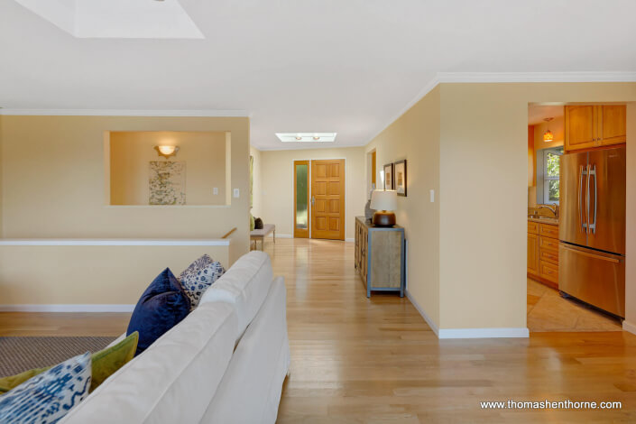 Open floor plan with kitchen to the right and living room to the left