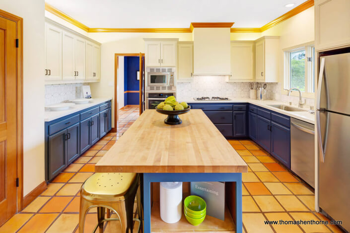 Kitchen with butcher block central island
