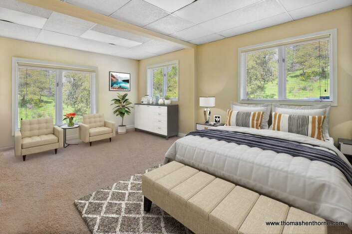 King size bed with striped pillows