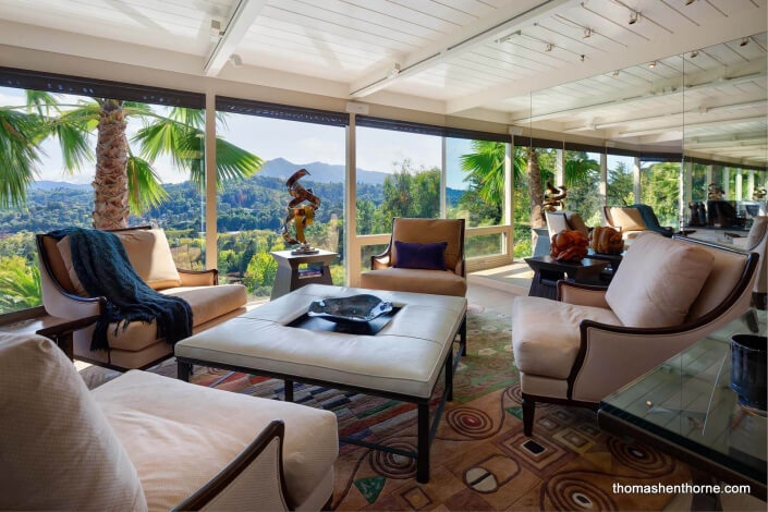 Living room with views of Mt. Tamalpais and open-beam ceilings