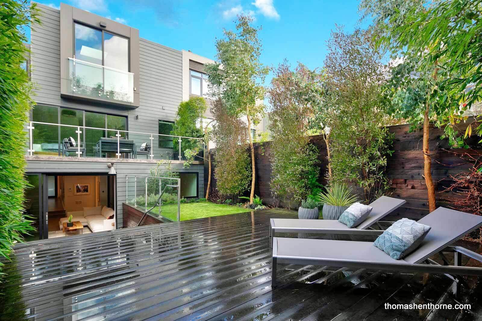 Back yard in San Francisco with deck and home in view