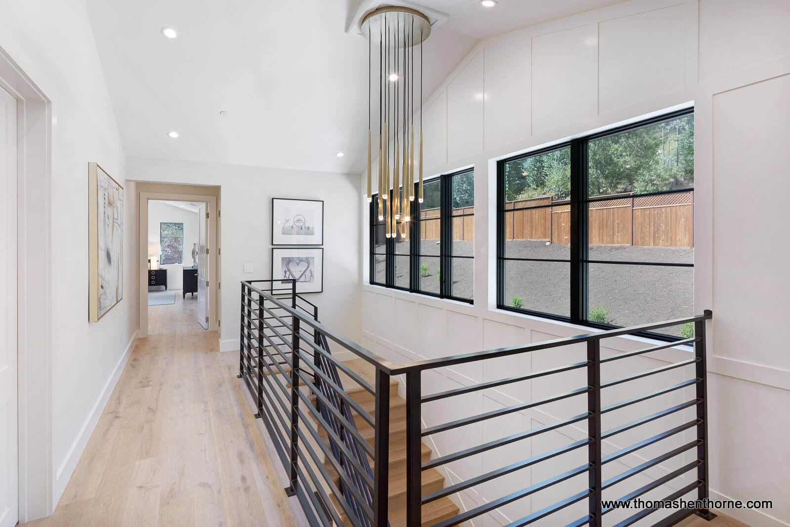 61-Gold-Hill 51 of 83 landing with metal railing and modern brass light fixture