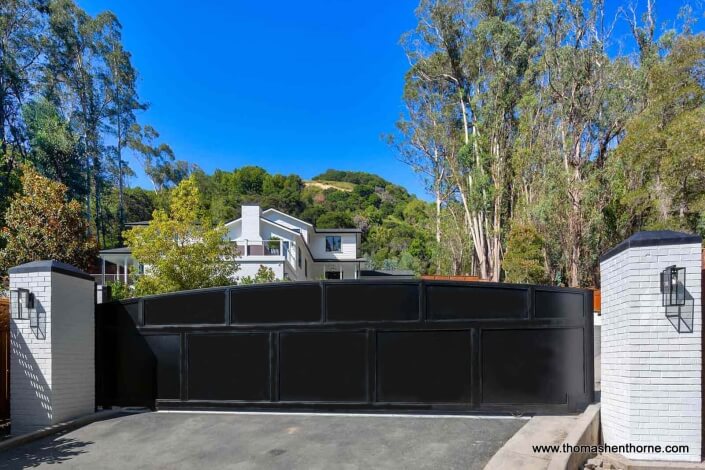 61-Gold-Hill 83 of 83 gate painted Black steel entry gates flanked by white brick columns