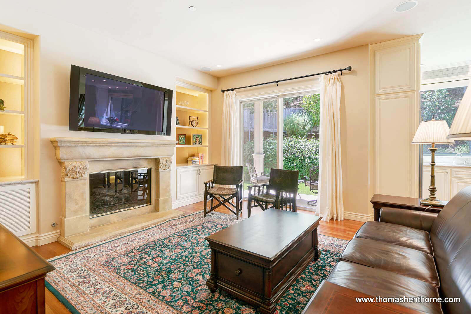 611-Fairway-Dr-Novato 24 of 108 Family room with TV over fireplace