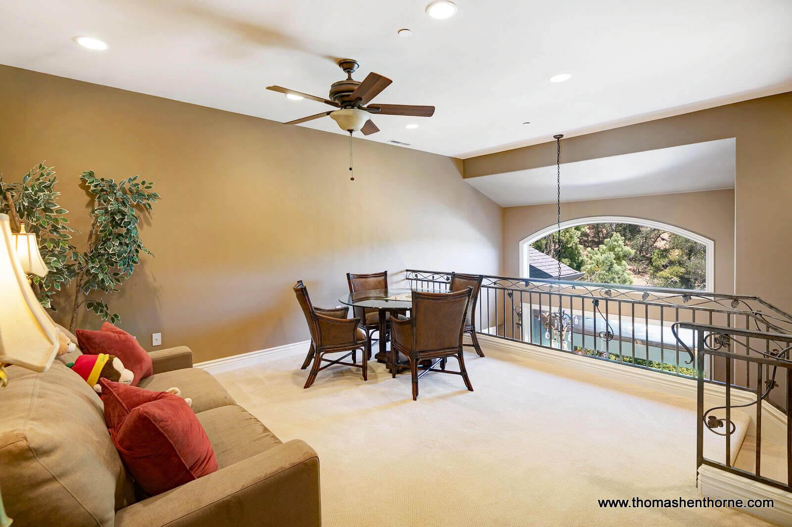 611-Fairway-Dr-Novato 50 of 108 upstairs landing with table and chairs and sofa