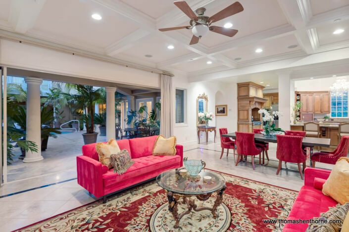 family room with red sofas