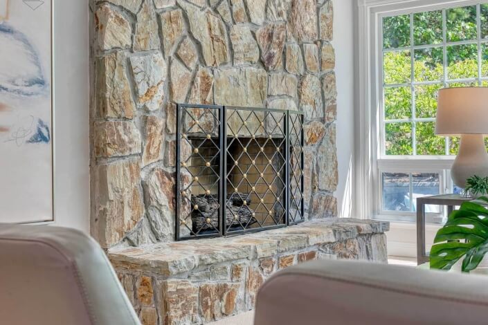 fireplace with stone surround