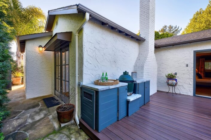 Big Green Egg built into outdoor kitchen area