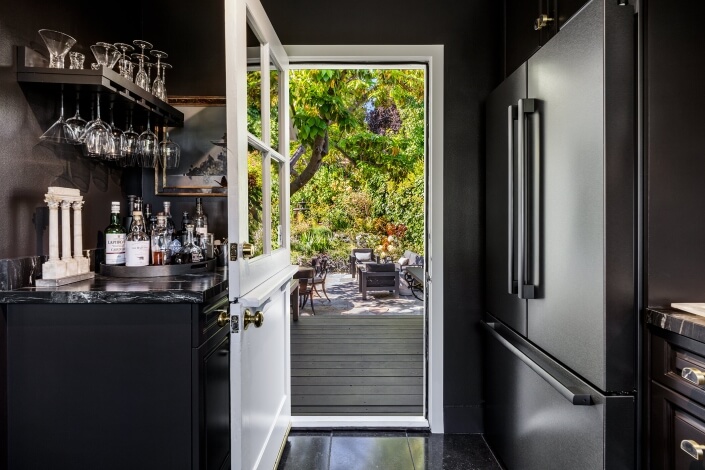 Kitchen opening to deck