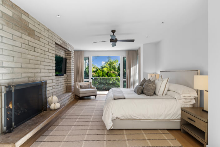 primary bedroom with fireplace