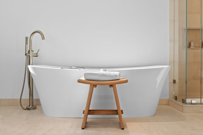 bath tub and stool with towel