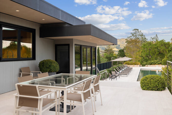 patio with glass table