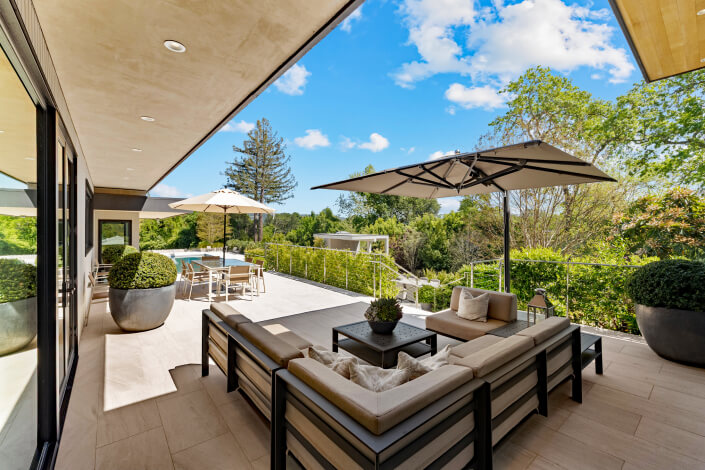 outdoor seating area with umbrellas