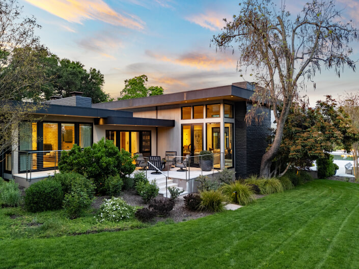 view of deck off billiard room and living room