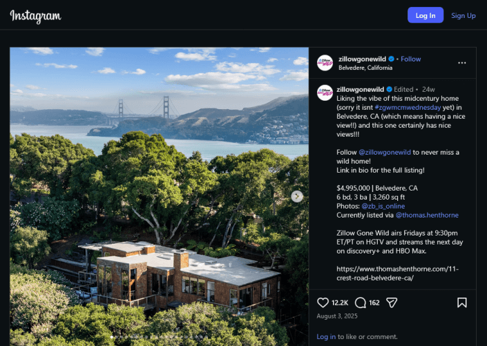 Zillow gone wild crest A modern house surrounded by trees overlooks the Golden Gate Bridge and San Francisco Bay in Belvedere, California, on a clear day. The house has large windows and a flat roof, blending into the lush green hillside.