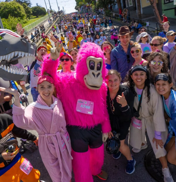 Bay to Breakers runners in colorful costumes in San Francisco Things-to-Do-in-SF-Bay-Area-May-2026-Bay-to-Breakers