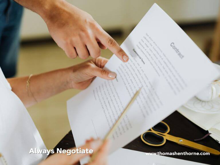 Always negotiate design canva Two individuals examine and discuss a contract document, with one person indicating a specific section on the paper. A pair of scissors and a pen rest on the table. The text displayed says, Always Negotiate.