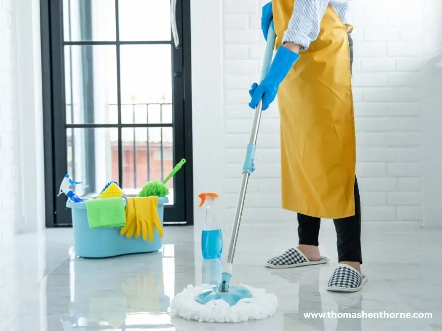 Person mopping the floor