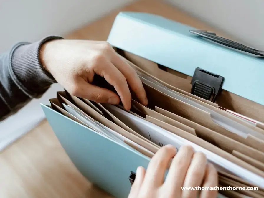 File folders and two hands
